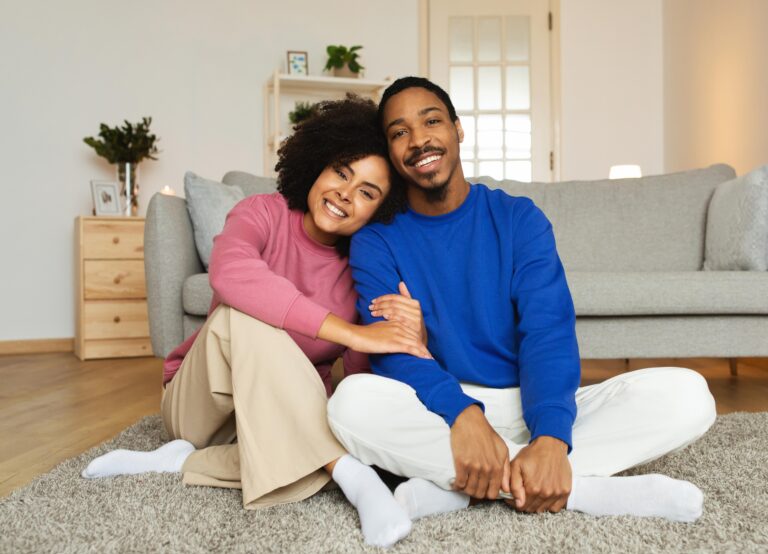 A couple relaxing together in their living room